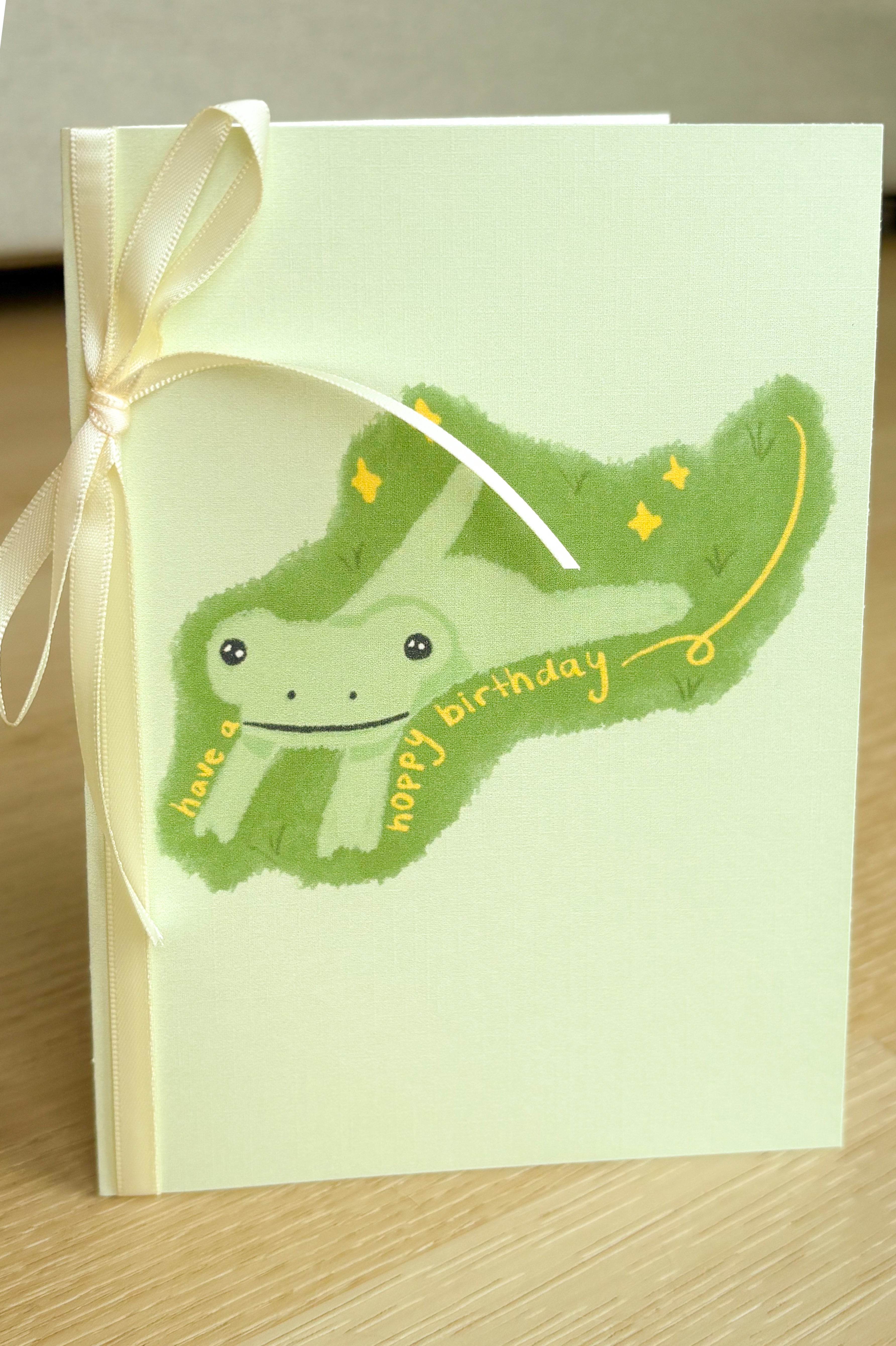 "Have a Hoppy Birthday" Ivory Linen Textured Card With Ribbon
